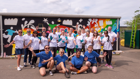 PPG COLORFUL COMMUNITIES® volunteers complete an educational mural in Birstall, United Kingdom, as part of one of the 27 projects completed in year three of the New Paint for a New Start initiative. (Photo: Business Wire)